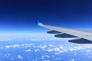 view of a plane wing in the sky
