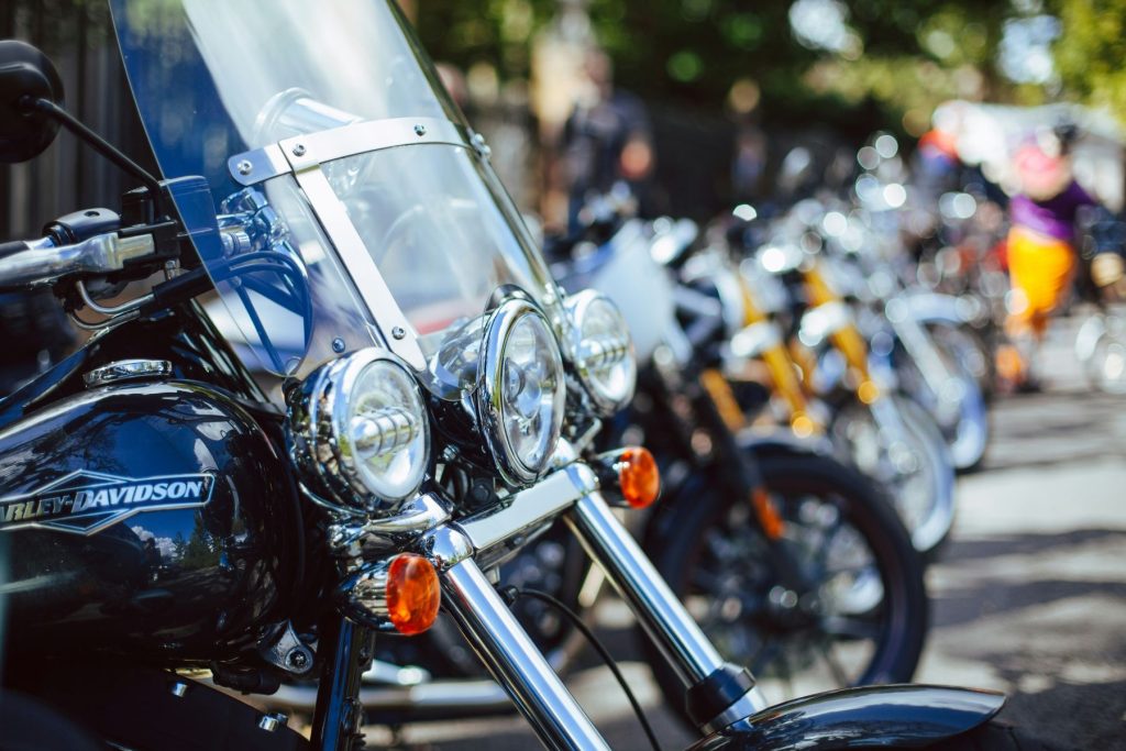 motorcycles lined up in a row on the street