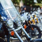 motorcycles lined up in a row on the street